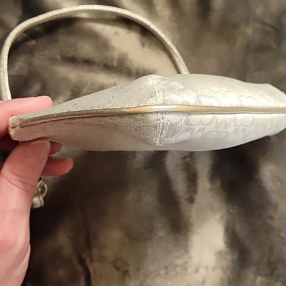 Elegant Coach White and Silver Wristlet